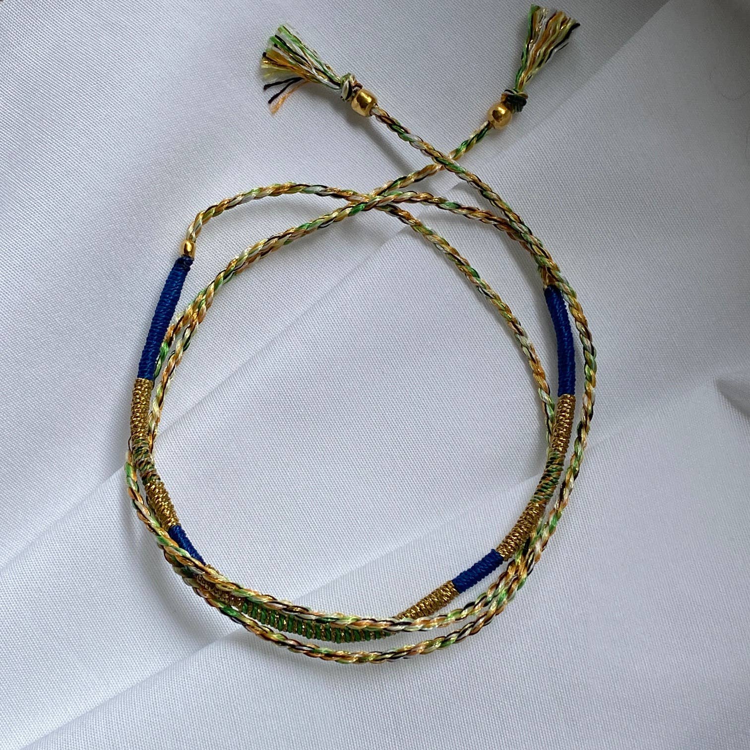 Bracelet cordon porte bonheur Sukh Sophie Deschamps