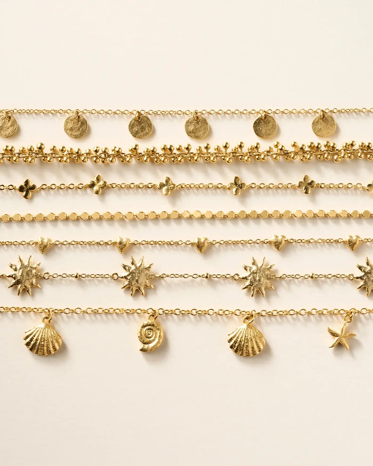 Bracelet Alceste doré à cinq médaillons – Agapée Jewelry