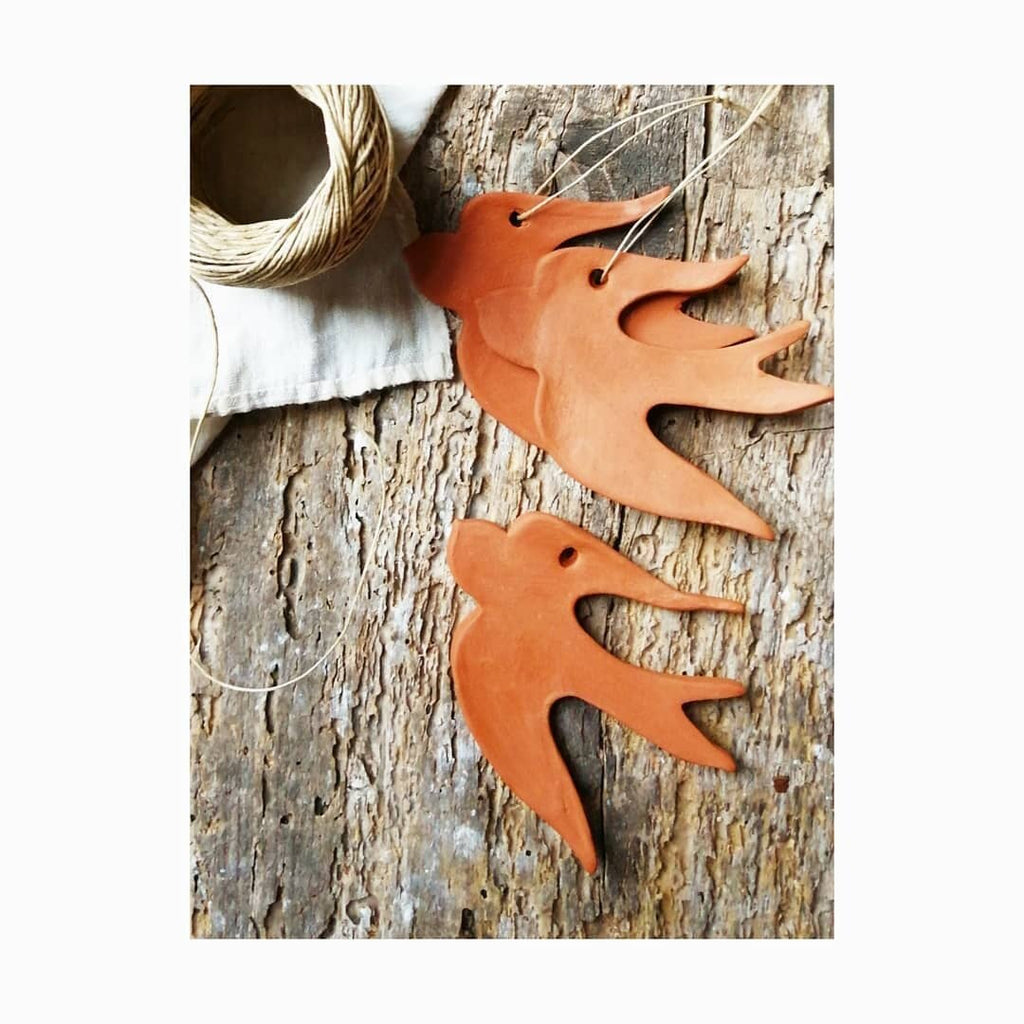 Hirondelle céramique terracotta à suspendre